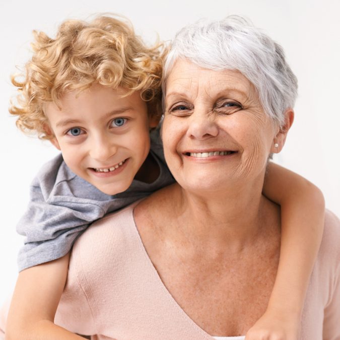 Grandson on Grandmother's Back