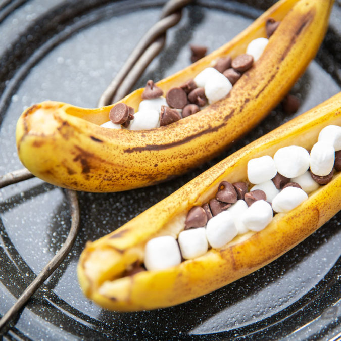 Campfire banana boats with marshmallows and chocolate chips