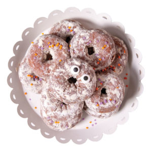 donuts that look like little monsters with googly eyes