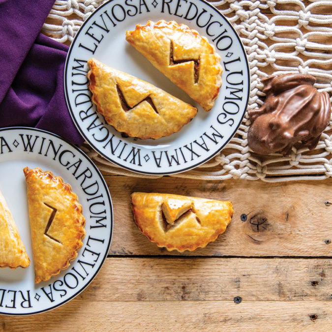 Overhead photo of pumpkin pasties and chocolate frog