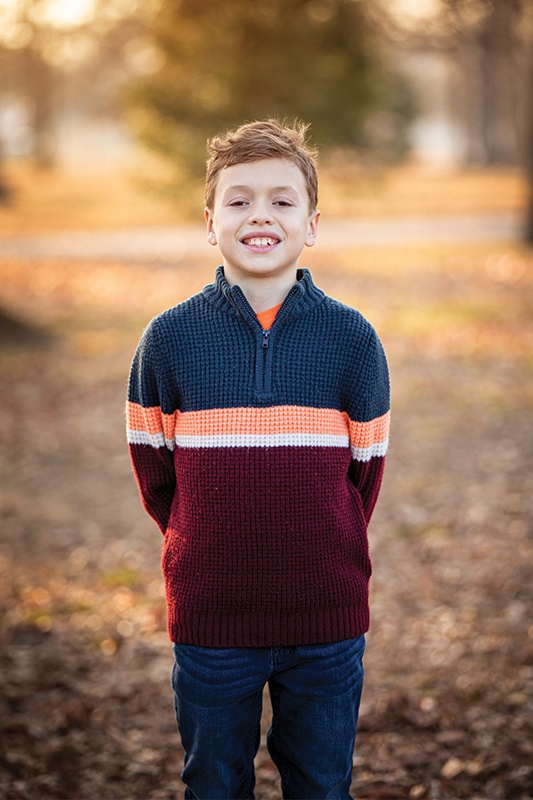 Paxton smiles for a portrait