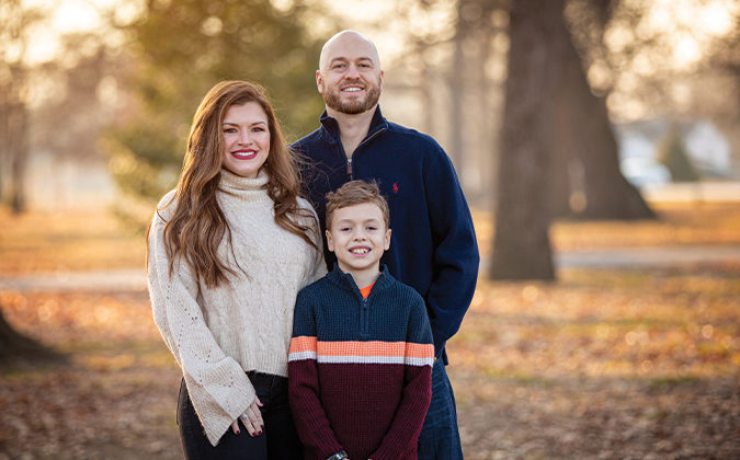 The Hayden family smiling for a family photo