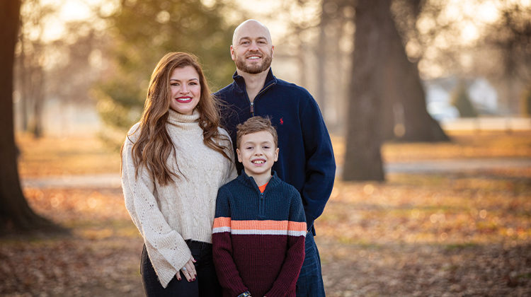 The Hayden family smiling for a family photo