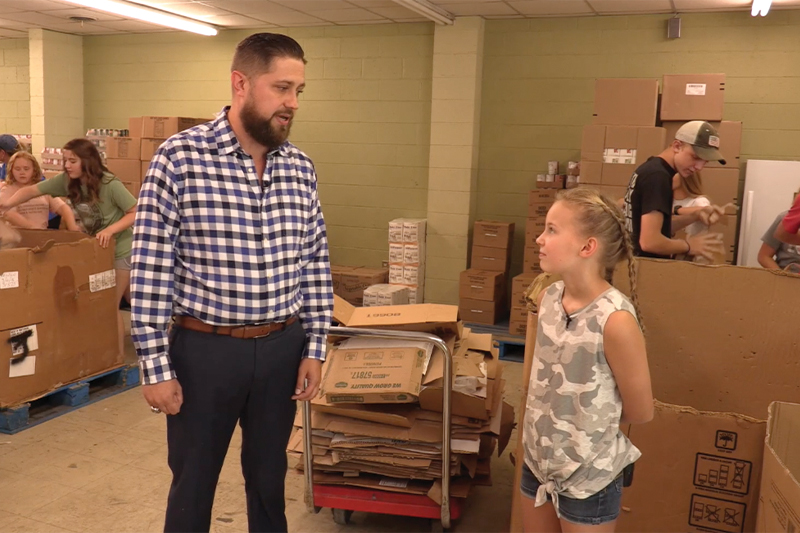 Addie Mae Lanham interviewing people